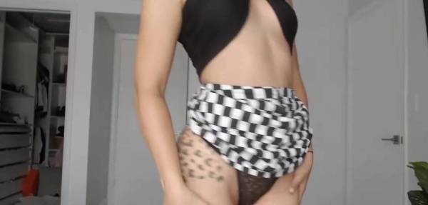 Beautiful curly bitch Xoleelee in a skirt posing for the camera on www.girlzfan.com